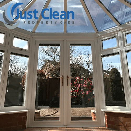 Traditional glazed conservatory adjoining a house