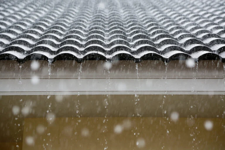 Roof tiles beside a skylight