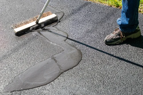 Applying treatment to a flat roof surface