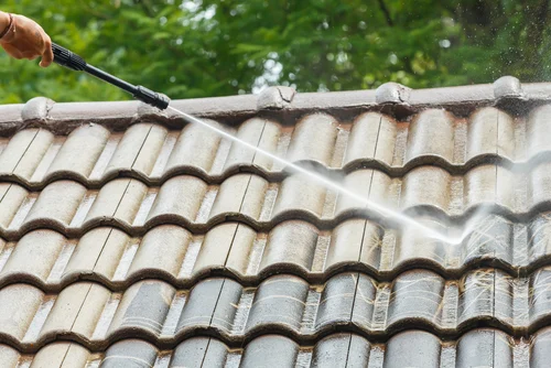 Roof tiles beside a skylight