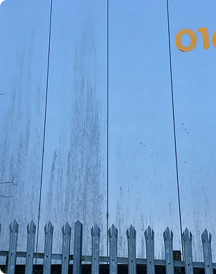 Blue commercial cladding before cleaning