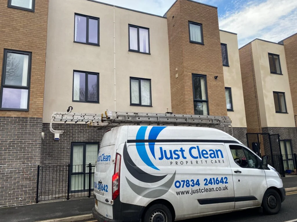 Rendered exterior of a property with a Just Clean van outside