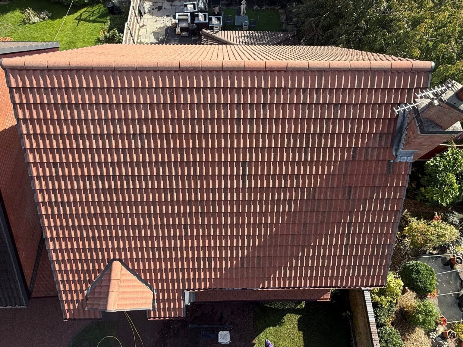 Red tiled roof after cleaning at the Rixton property