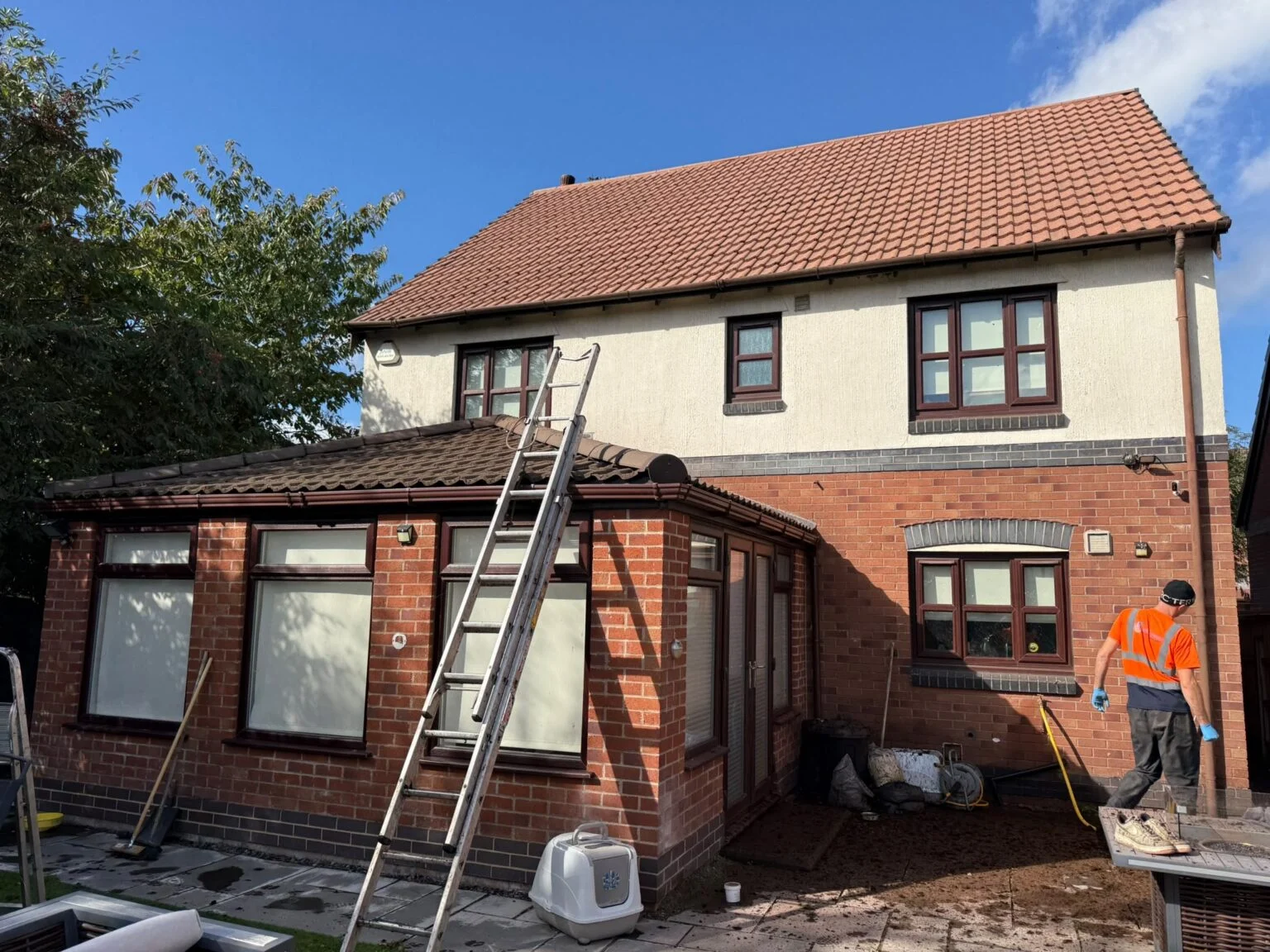 Access equipment outside the Rixton roof cleaning project