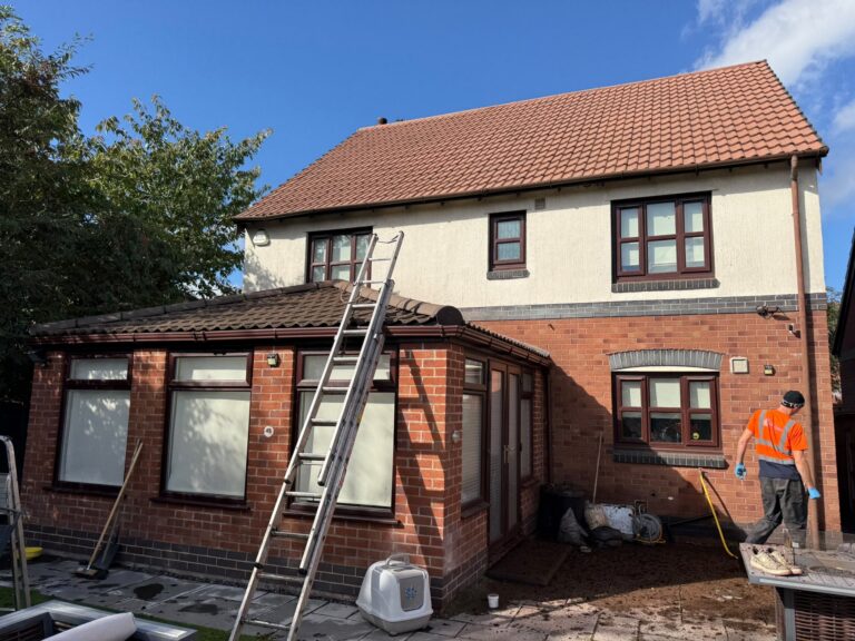 Access equipment outside the Rixton roof cleaning project