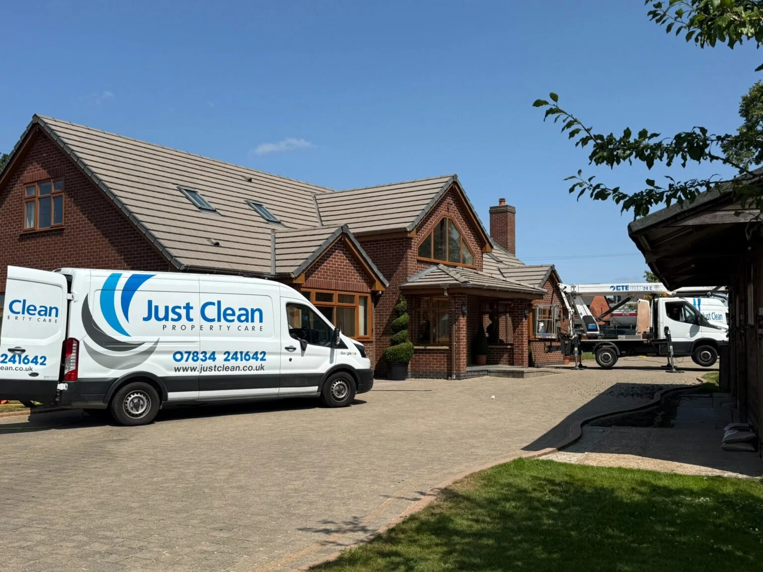 Just Clean van outside the documented Warrington roof cleaning project