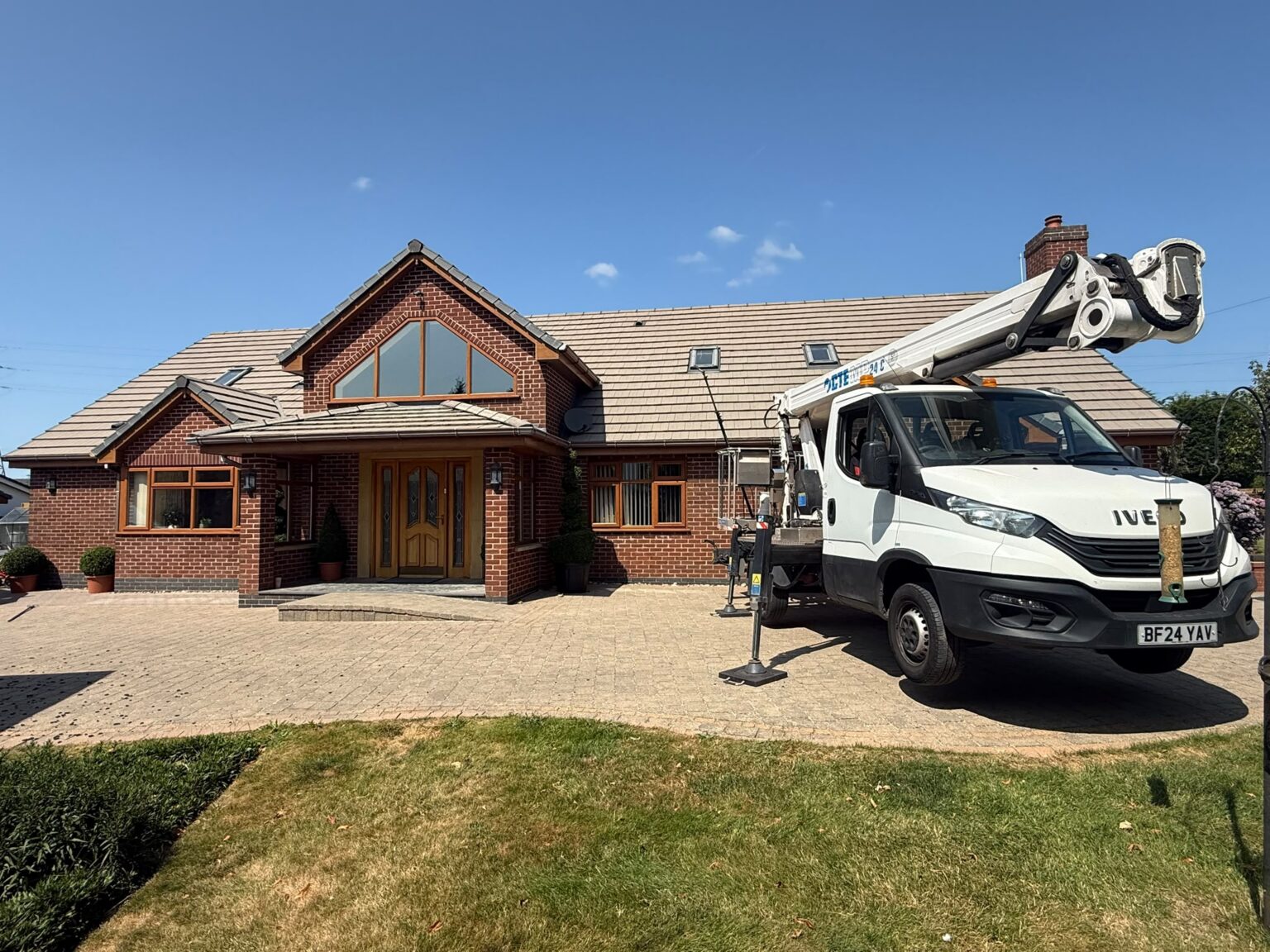 Just Clean van and access equipment outside the Warrington roof project