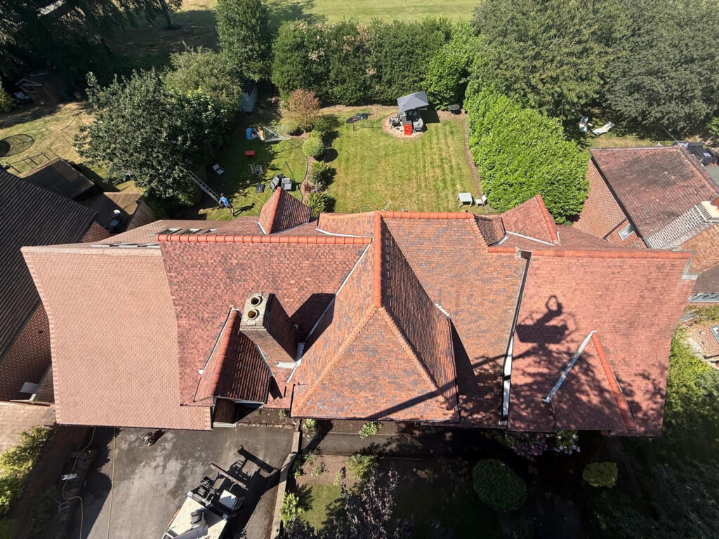 Red tiled roof after cleaning on the Warrington roof project